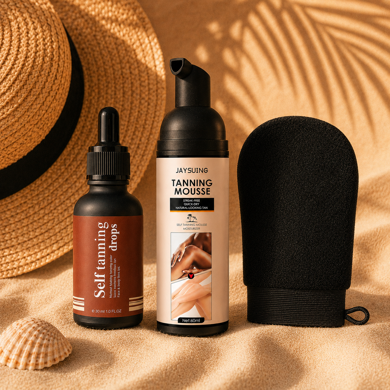 Sundipt Summer Glow Kit — Self-Tan Drops, Tanning Mousse and Tan Prep Mitt on sun-warmed sand with straw hat