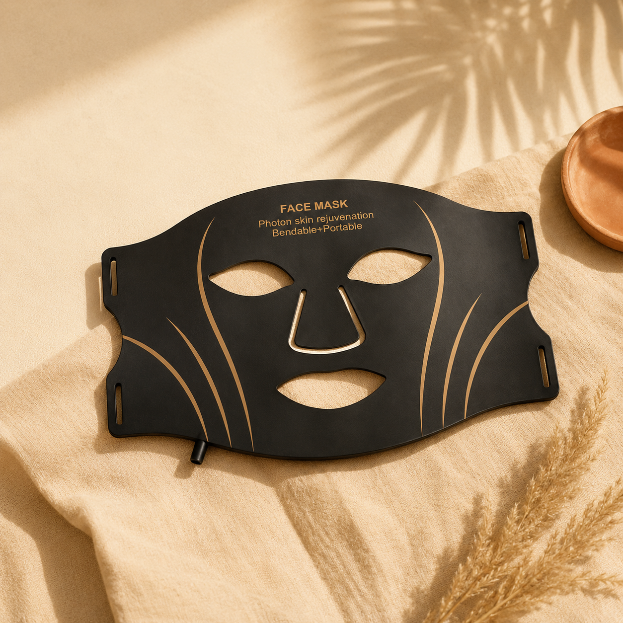 Sundipt Glow Mask — black gold LED face mask flat-lay, included in the Everything Kit